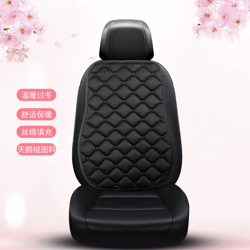 Black leather car seat cushion set with diamond stitching and a padded headrest