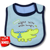 A light blue baby feeding bib with a cartoon dinosaur design and dark blue trim.