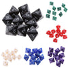 A set of ten acrylic polyhedral dice in various colors and shapes for tabletop role-playing games