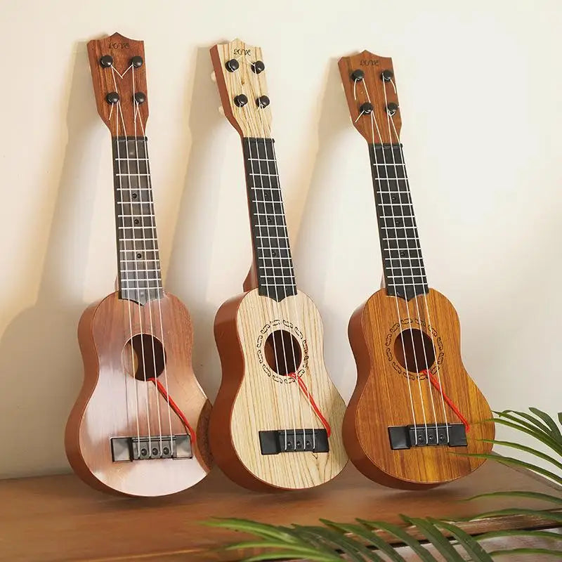 Three wooden toy guitars with ukulele sound, featuring natural wood finishes and strings.