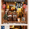 A miniature Japanese izakaya dollhouse kit featuring wooden furniture, decorative items, and a small fox figure.
