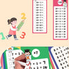 A hand is shown writing math problems on flash cards, including addition and multiplication examples.
