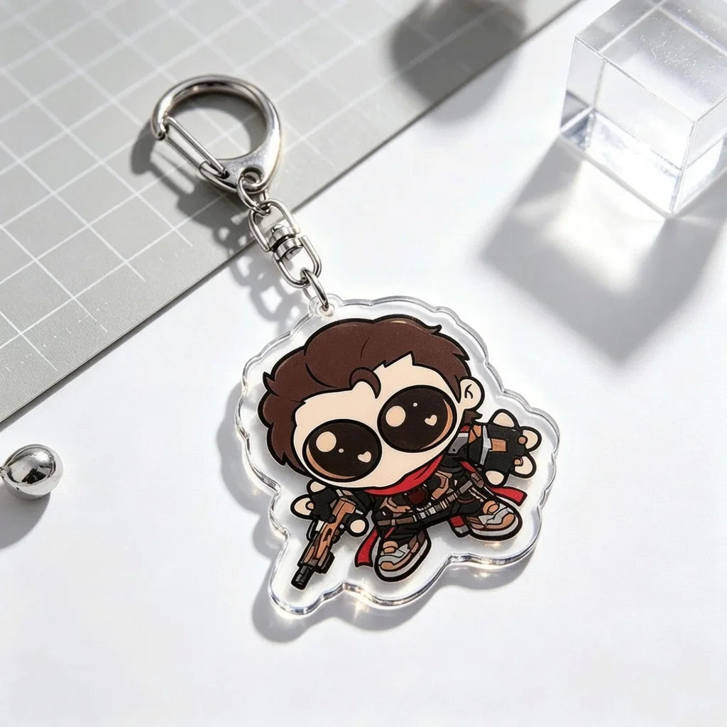 A clear acrylic keychain charm featuring an anime-inspired character design on a silver metal ring.