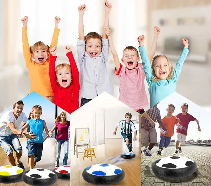 A group of happy children playing with glowing LED hover soccer balls.