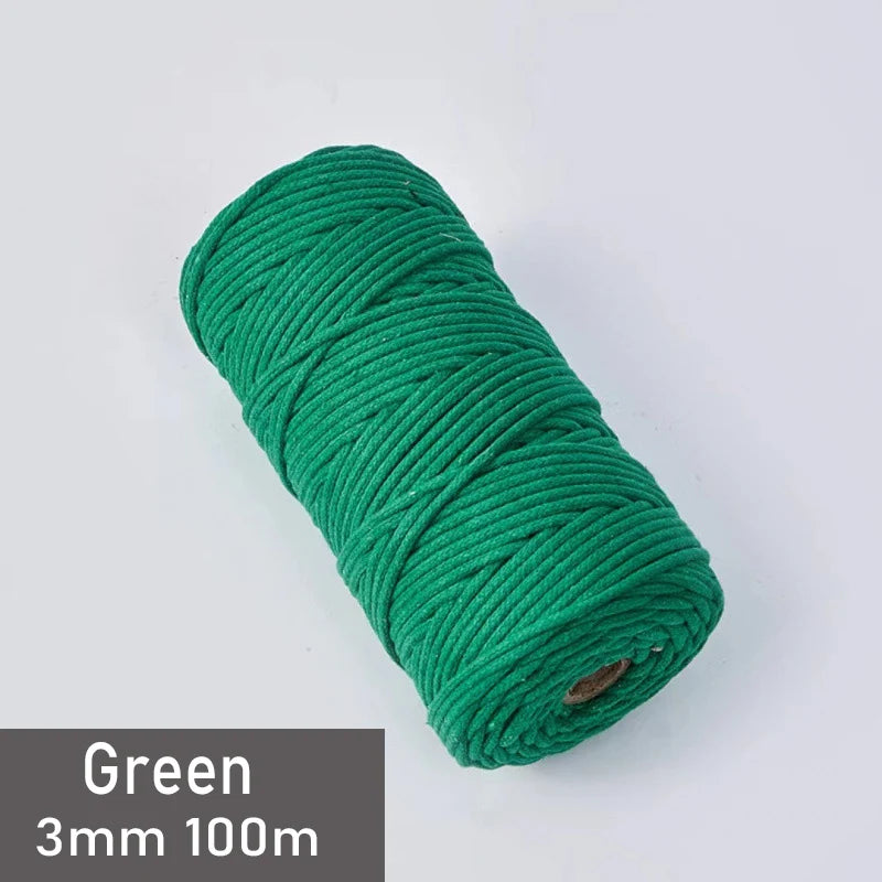 A spool of green 3mm cotton macrame cord measuring 100 meters.