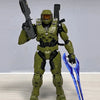 A 1/12 scale Master Chief action figure in olive green armor holding a rifle and a blue blade.