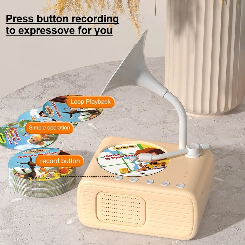 A beige electronic device with a horn-like speaker is shown next to colorful learning cards and a recording button.