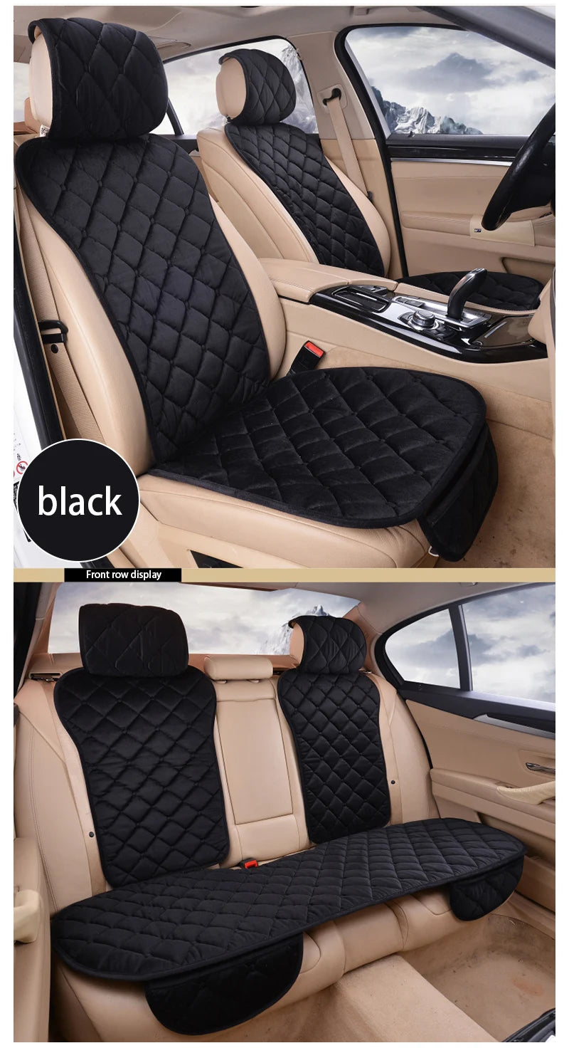 Black universal car seat protector with quilted fabric and anti-slip backing installed in a car interior.
