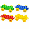 A set of four large building block traffic vehicles in green, blue, red, and yellow.