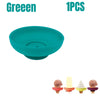 A teal silicone popsicle holder with various ice cream popsicles displayed below.