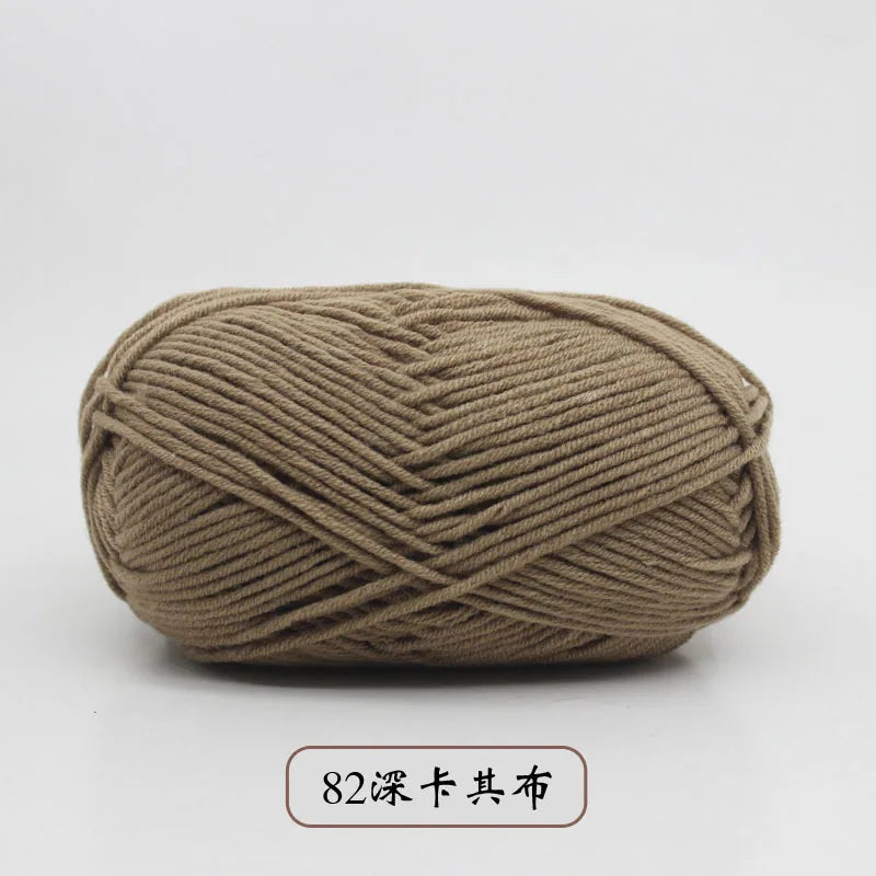 A ball of pre-dyed milk cotton yarn, soft 5-ply blended yarn for knitting and crochet.