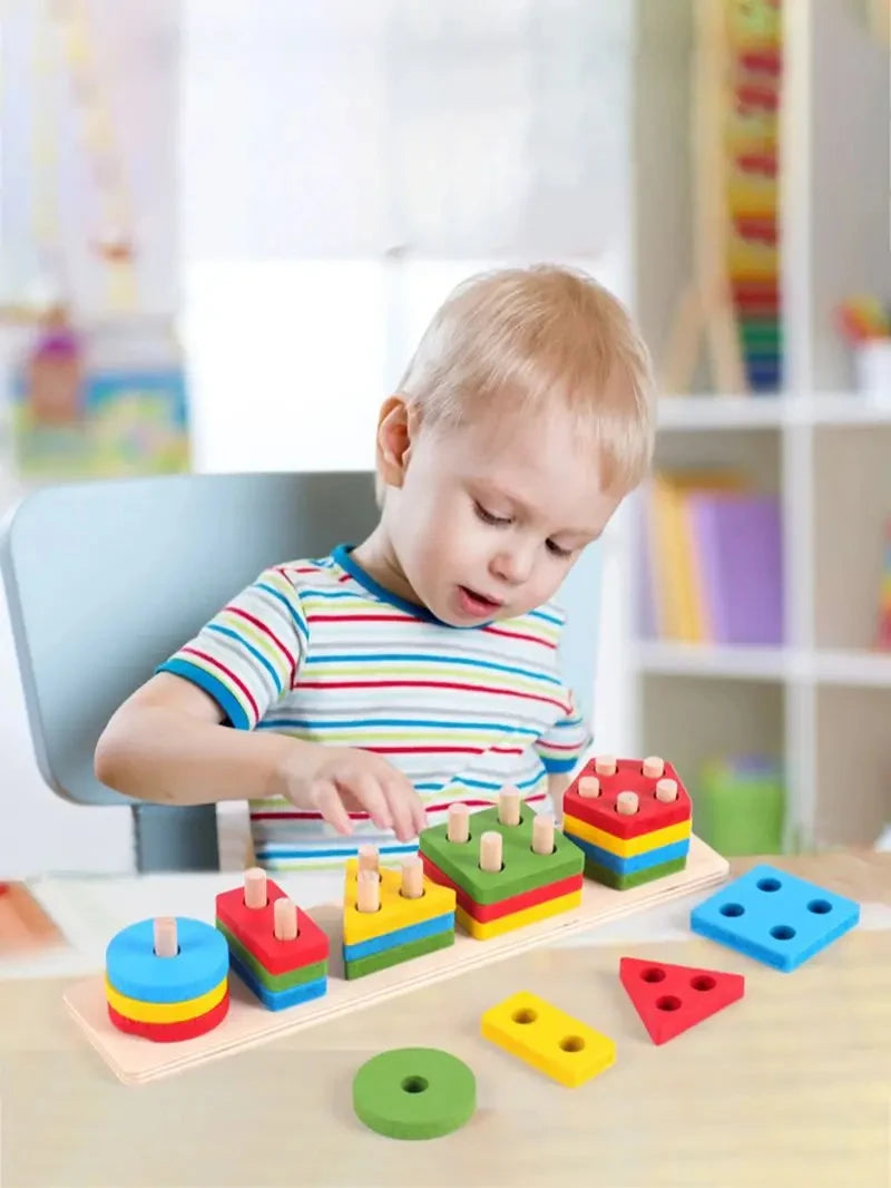 A child is playing with a wooden geometric shape sorter puzzle featuring colorful blocks and shapes.