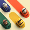 A set of three push-and-go animal car toys in gray, orange, and yellow on colorful geometric backgrounds.