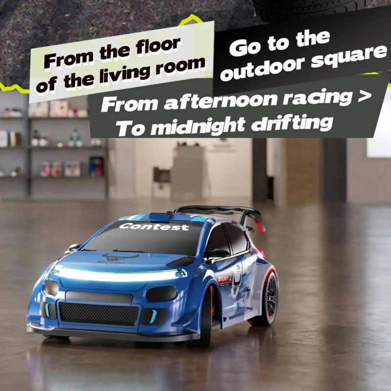 A blue 2.4G 4WD RC drift car with contest decals is shown on a wooden floor.