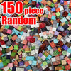 A pile of 150 random colored magnetic building cubes and stacking blocks.