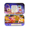A purple wooden box containing a Starlight Amusement Park themed kit with miniature figures and scenery.