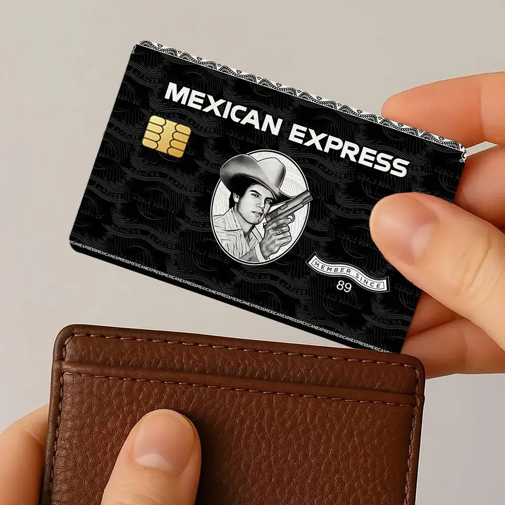 A close-up of a Mexican Express card skin sticker set placed on a brown leather wallet.