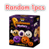 A box of random Halloween mystery squishy stress relief toys featuring pumpkins and ghosts.