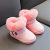 Pink girls snow boots with crystal bowknot detail and plush pink faux fur lining