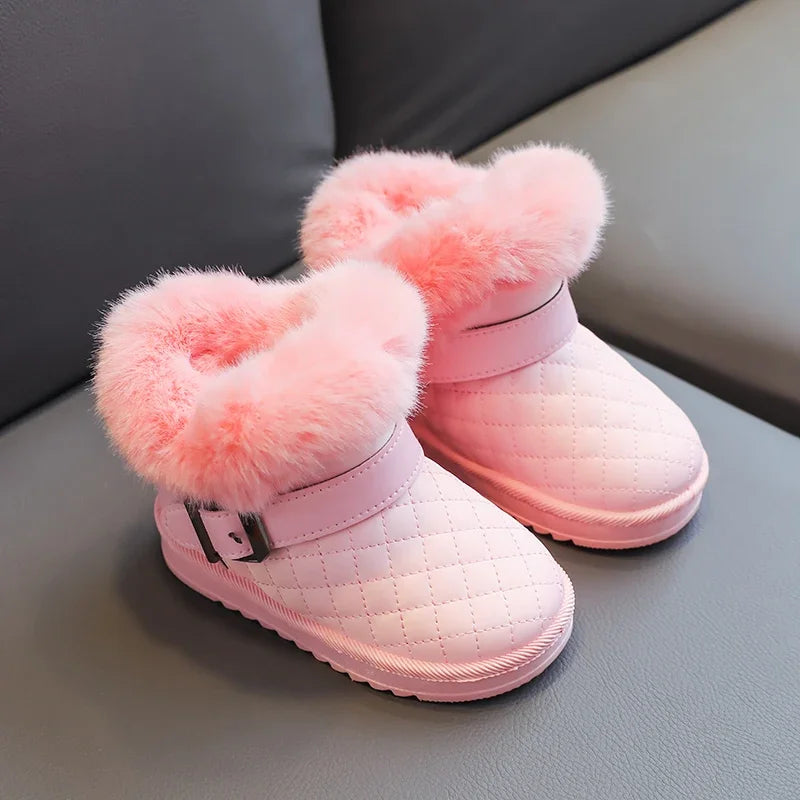 Pink girls snow boots with crystal bowknot detail and plush pink faux fur lining