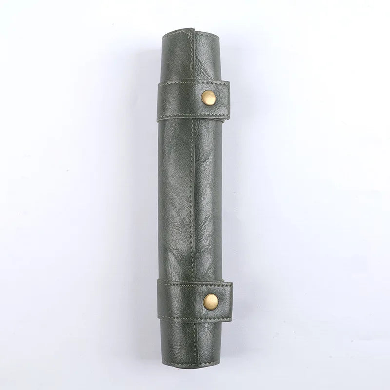A vertical storage bag made of dark gray PU leather with brass snaps, designed for a foldable dice rolling tray.