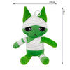 A green plush toy resembling a cat with white bandages wrapped around its head and body.