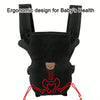 Black ergonomic baby carrier designed for baby's health with adjustable straps and a tooth graphic.
