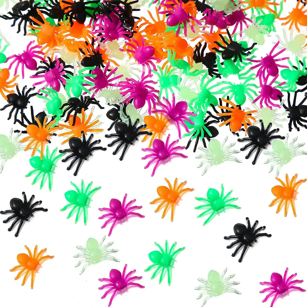 A pile of realistic fake spiders in various bright colors including orange, pink, green, and black.