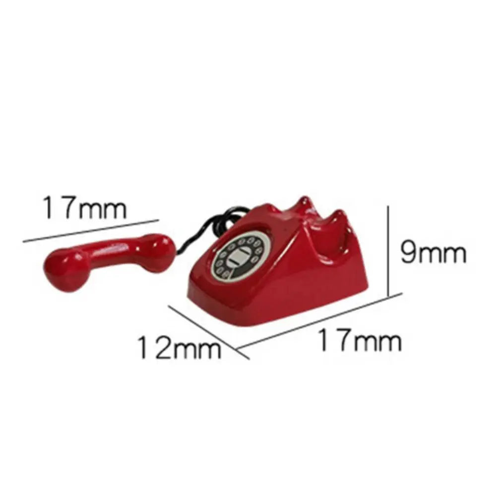 A red vintage rotary telephone miniature for a dollhouse, shown with dimensions.