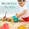 A young girl plays with a beach toy set including a bucket and shovel in sand on the beach.