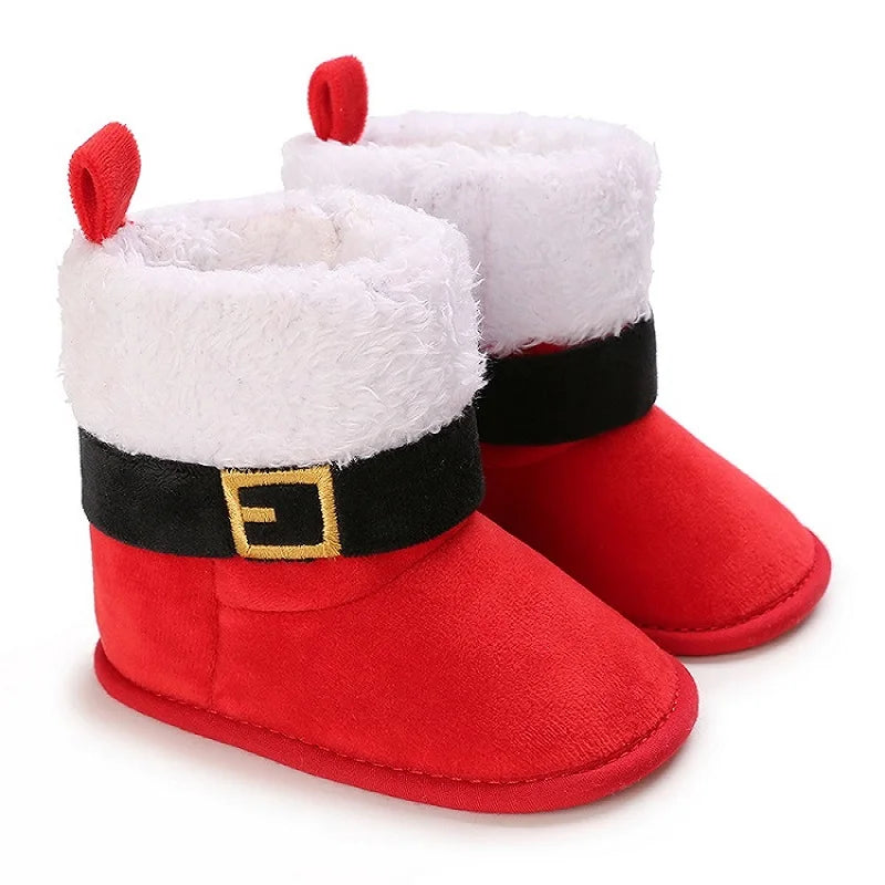 A pair of red baby first walker shoes with white faux fur trim and black accents.