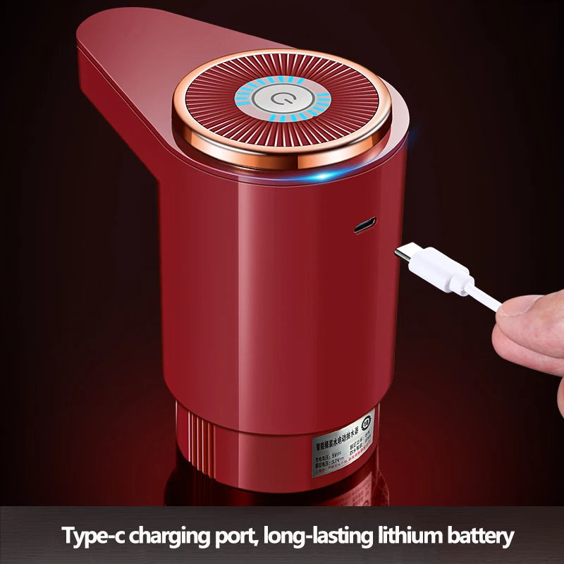 A red electric water dispenser pump with a top-mounted circular component and a Type-C charging port is shown being held by a