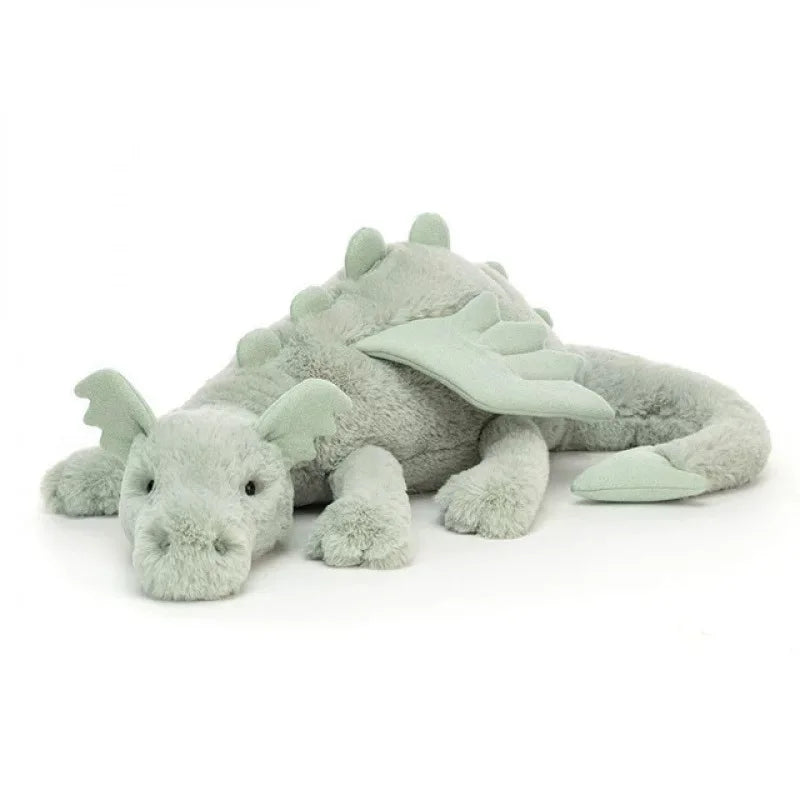 A soft, light green rainbow dragon plush pillow with large ears and a serpentine body.