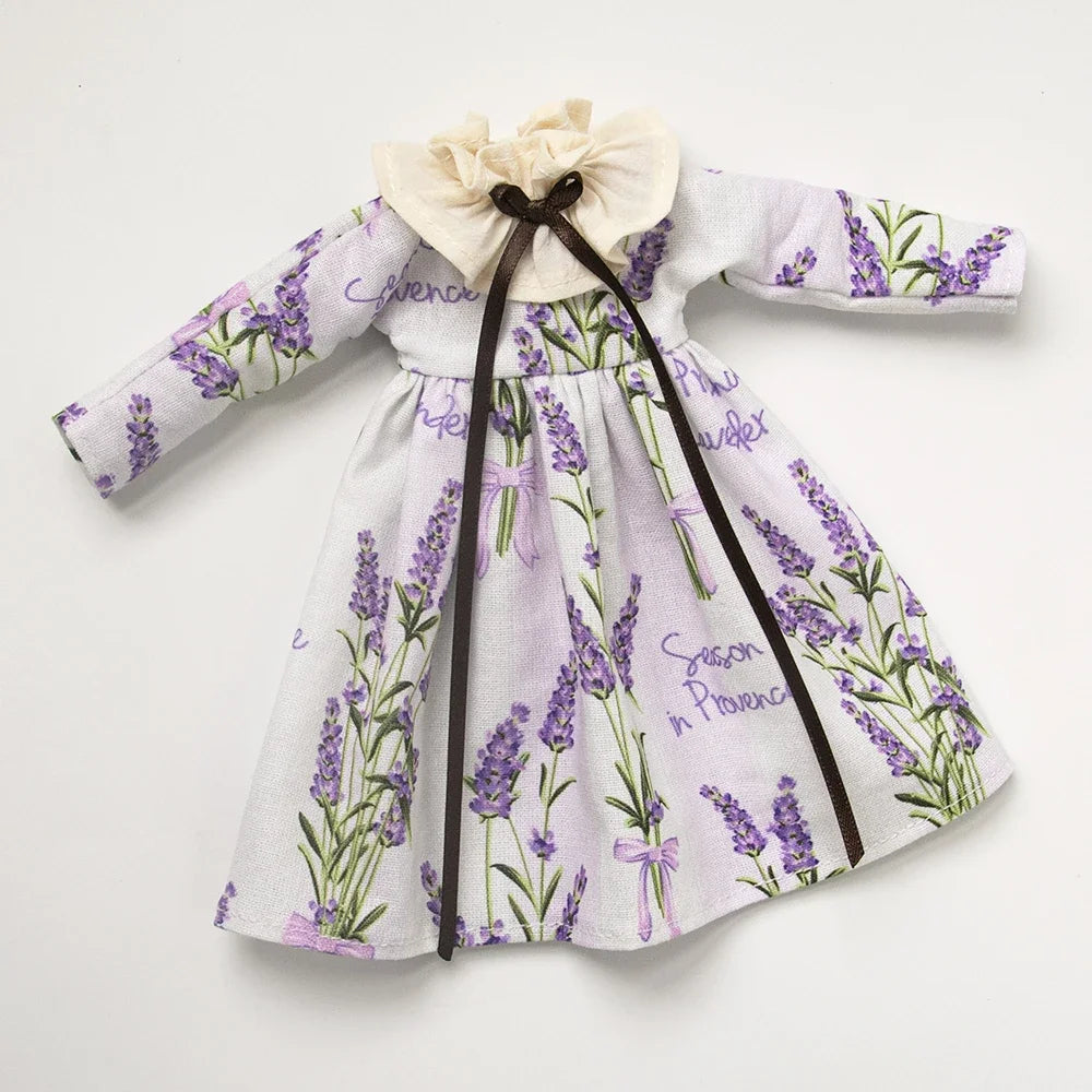 A vintage lace maid dress set for 1/6 scale dolls featuring a lavender floral print and a sheer fabric collar.