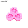 Pink silicone mold shaped like a peony or rose flower for resin, jewelry, and baking.