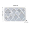 A white silicone mold set with various diamond-shaped cavities for making epoxy resin earrings and pendants.
