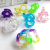 A collection of colorful crystal fidget twist rope toys in various colors like purple, yellow, green, and pink.
