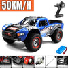 Blue and black high-speed 4WD brushless RC monster truck with large tires and racing decals.