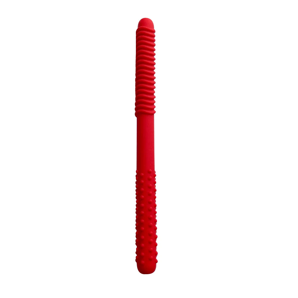 A red silicone chewing tube for kids used for oral motor training and teething relief.