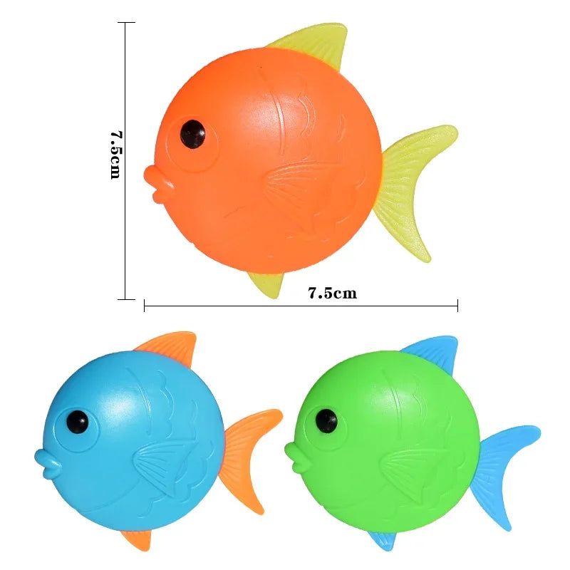 Two plastic shark pool diving toys, one orange and one green, shown from the top.
