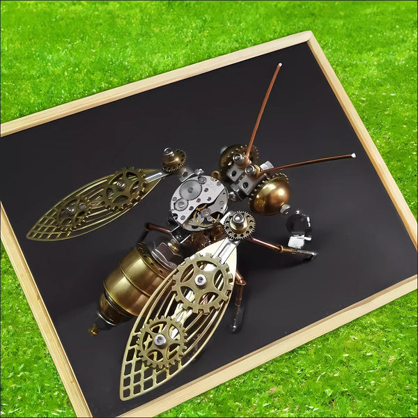 A detailed 3D metal bee and wasp puzzle displayed on a dark background within a wooden frame on green grass.