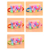 A set of clear plastic containers filled with colorful silicone balls for a party game