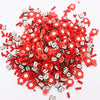 A pile of red polymer clay sprinkles mix used for slime decor and DIY craft accents.