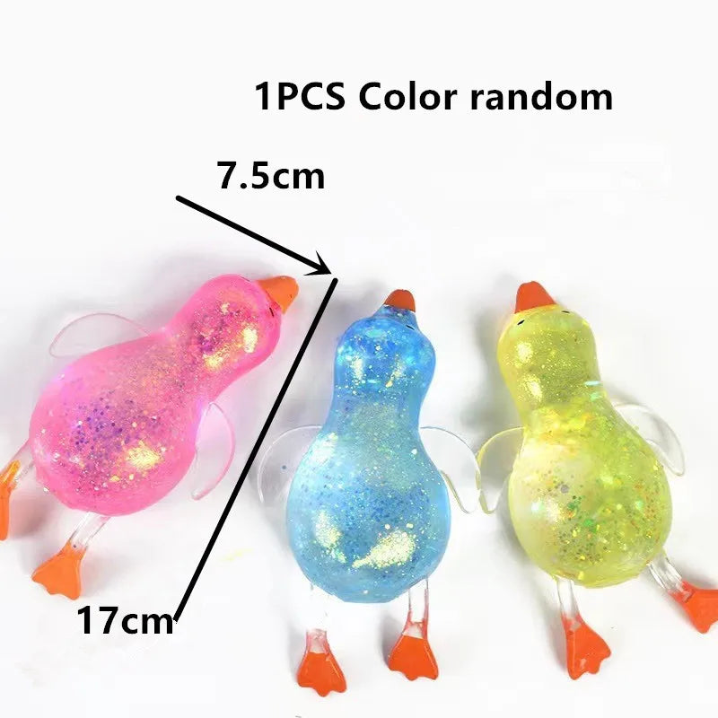 One piece random color duck squeeze toy with a 7.5cm body and 17cm total length