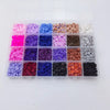A clear plastic box filled with various colors of flat round polymer clay beads for DIY jewelry making