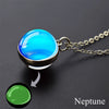 A pendant necklace featuring a bright blue, glow-in-the-dark sphere representing Neptune.