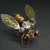 A detailed steampunk mechanical bee model kit featuring brass and bronze metal parts and intricate wings.