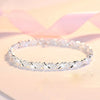 Elegant sterling silver snake chain bracelet for women sparkling with diamonds