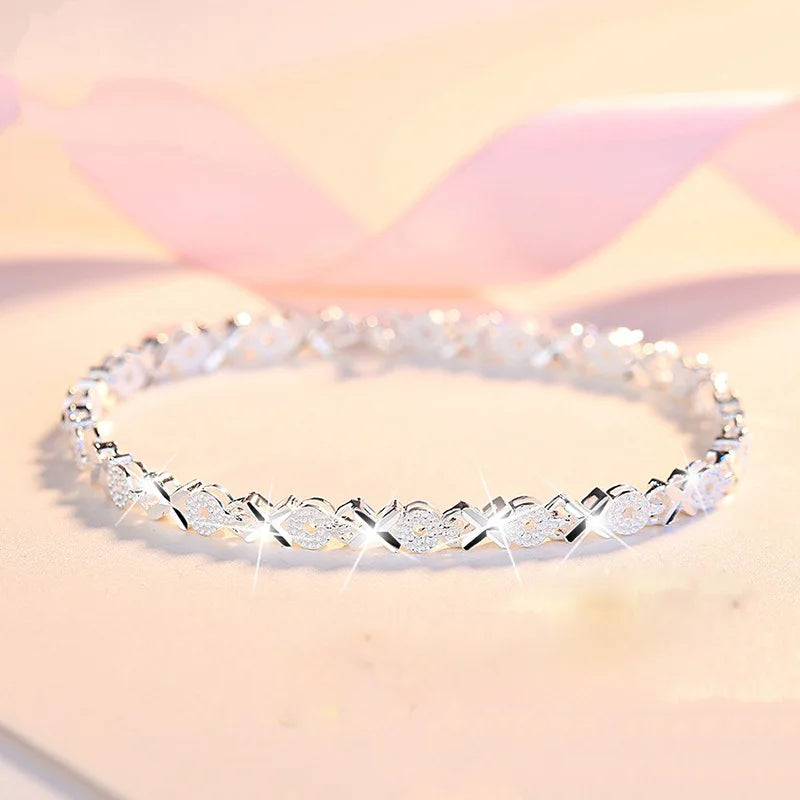 Elegant sterling silver snake chain bracelet for women sparkling with diamonds