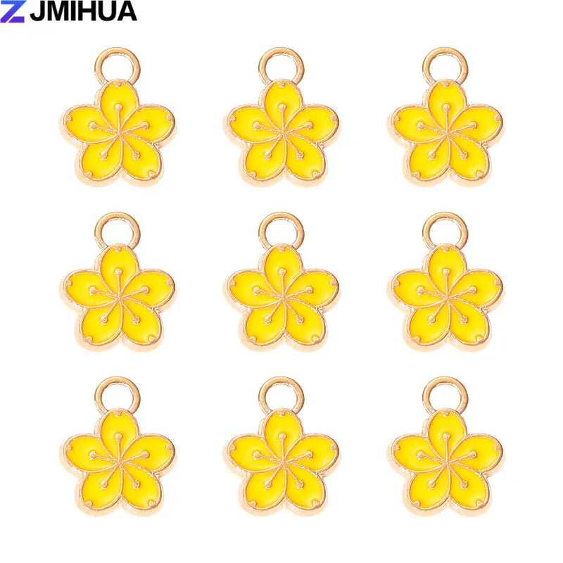 A set of 15 enamel flower and cherry charms for jewelry making